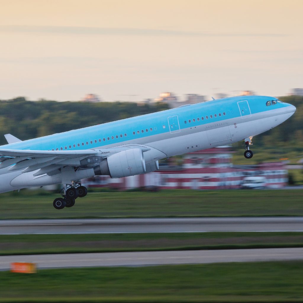 Modern passenger airplane take off from runway. Vacation, aviation concept